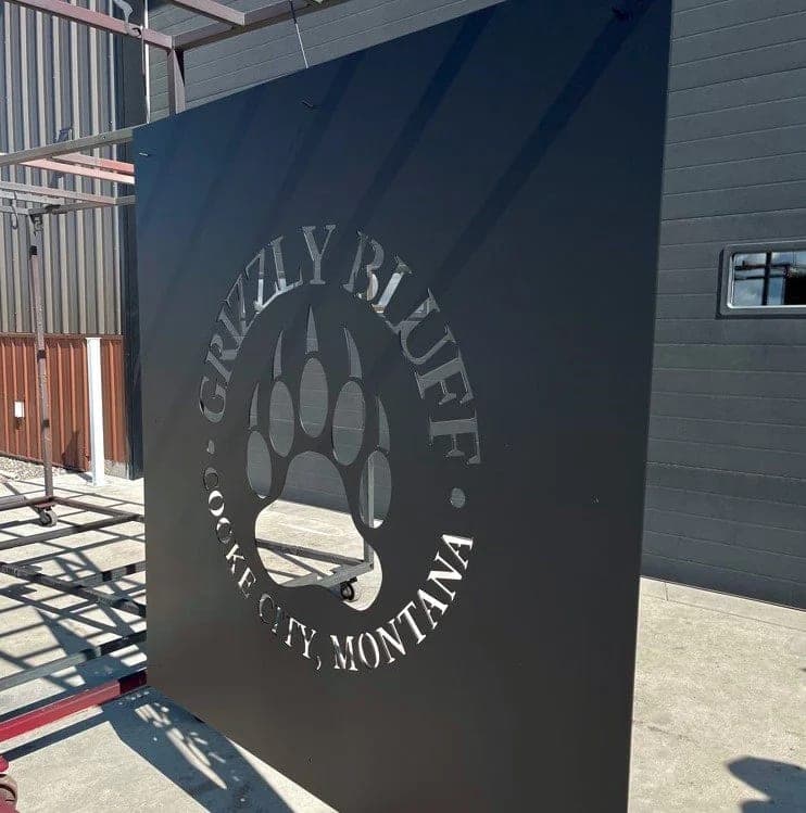 Grizzly Bluff bear paw logo