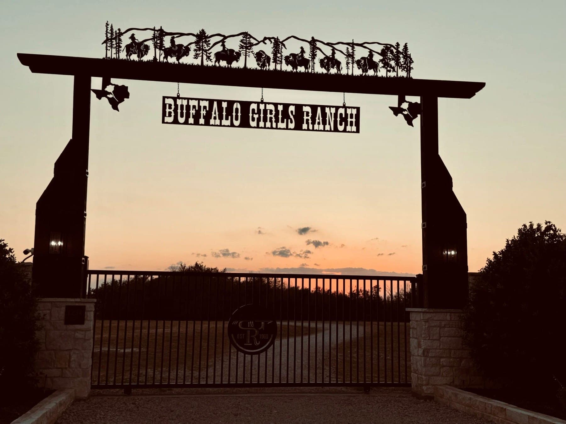 Buffalo Girls Ranch entrance at dusk